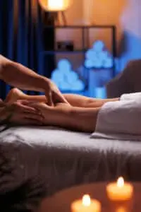 a person receiving a leg massage