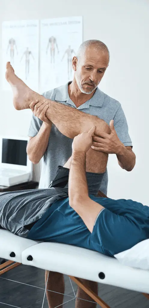 a man holding a leg